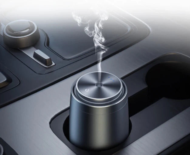 Aroma diffuser in a car cup holder